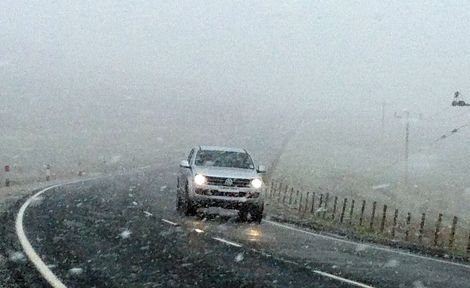 Heavy snow showers affecting road conditions on the A970 on Monday - Photo: Shetland News