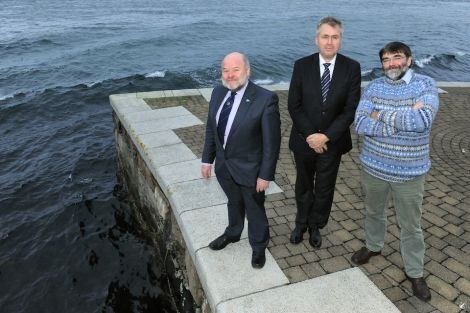 Vattenfall's Jorgen Josefsson (centre) told SIC development chairman Alastair Cooper (left) and Shetland Charitable Trust vice chairman Jonathan Wills he is impressed with the local waves. Pic. Millgaet Media