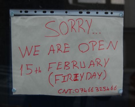A notice in the window announcing when the kebab shop will re-open. Pic. Shetnews