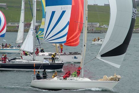 Yachts participating in the Shetland Race leaving Lerwick harbour.