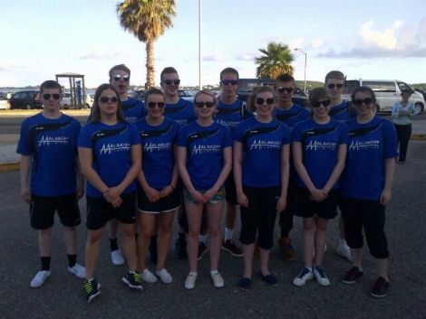 Shades on! The Shetland swimming team arrived in Bermuda mid week to acclimatise to a palm tree friendly climate. Back (from left): Gregor Moore, Jake Swanson, Callum MacGregor, Felix Gifford, Donnie Price. Front: Calum MacColl, Amy Harper, Andrea Strachan, Megan Petursdottir, Emmie Hutchison, Anne Hutchinson and Kate Jones.