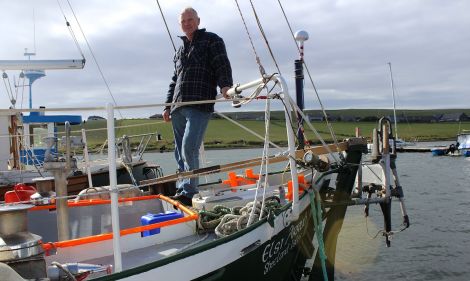 Andrew Halcrow on board the Elsie Arrub at the East Voe marina, earlier this month - Photo: Hans J Marter/ShetNews