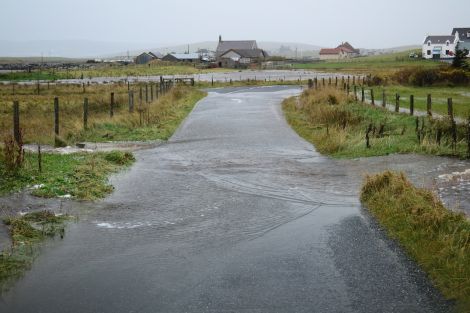 The road at Glebe, Bressay, was awash with water on Sunday morning. Photo Mark Berry