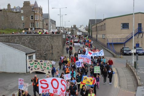 Protesters marching against cuts to rural education in June. Photo: Shetnews