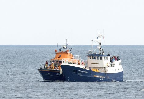 Lerwick lifeboat is taking the Good Shepherd with 15 people on board under tow on Tuesday morning _ Photo: John Moncrieff