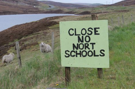 A sign protesting school closures in Northmavine