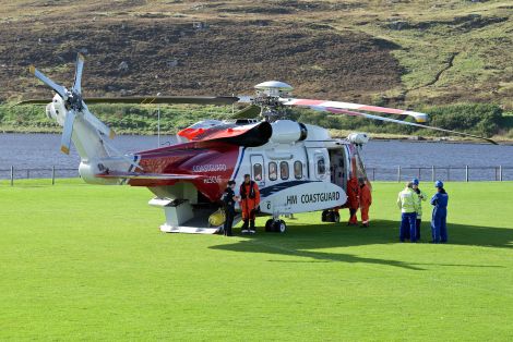 The Stornoway search and rescue helicopter near the Clickimin landing site on Wednesday afternoon.