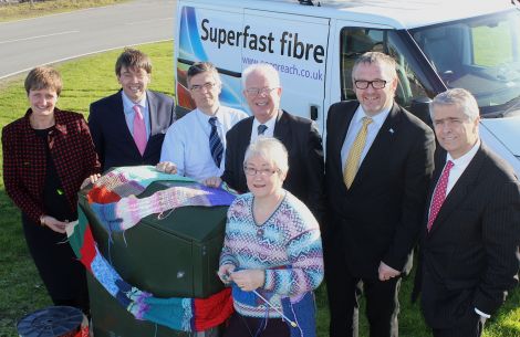 Launching superfast fibre with the help of Shetland’s own Hazel Tindall, the world’s fasted knitter, are (from left): HIE’s director of regional development Carroll Buxton, BT Scotland director Brendan Dick, director of Digital Highlands and Islands Stuart Robertson, the Advocate General for Scotland Lord Wallace, SIC leader Gary Robinson and Bill Murphy, BT’s managing director of Next Generation Broadband – Photo: Hans J Marter/ShetNews