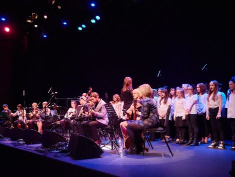 Bell's Brae pupils joining in with musicians as part of the 'Gathering' during Sunday's concert. Photo: Chris Brown