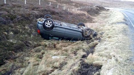 The driver and passenger were lucky to walk away shaken but uninjured after their car overturned and landed on its roof in a ditch.
