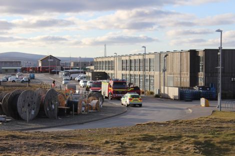 Fire engines and the police outside the Sella Ness accommodation block on Saturday evening. Photo Shetnews