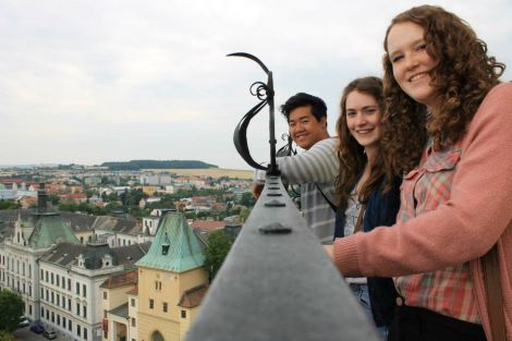 Shetland students, Kaylee Mouat (right) and Hannah Budge, with Phi-Luan Chung from Diepholz, Germany, enjoying the view from the Bata Tower in Zlin, Czech Republic at the 2014 Global Classroom Conference - Photo: SIC