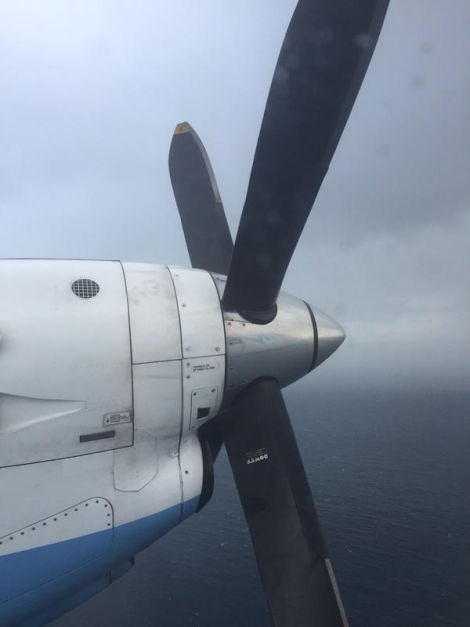 High in the sky, propellor not turning. Catherine Stihler MEP's photo of the engine shut down on board the Saab 340 as it returned to Kirkwall airport on Thursday afternoon.