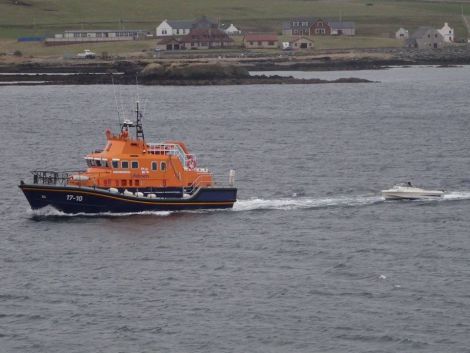 The Lerwick lifeboat tows in the speedboat Kestrel on Friday afternoon. Photo Carole Flaws