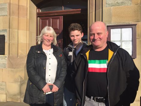 Businessman Henry MacColl (right) is looking forward to getting on and building his pizzeria. He is pictured outside Lerwick Town Hall with his wife Denise and son Joshua. Photo: Shetnews/Hans J. Marter