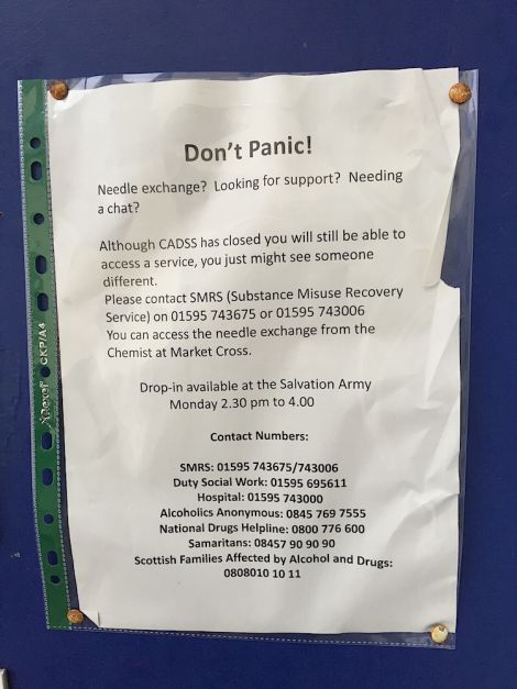 A note pinned to the door advises drug users where to find help - Photo: ShetNews