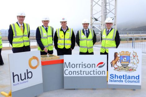 Pictured at today’s “topping out” ceremony at the new AHS are Alastair Nicol of the Scottish Futures Trust, SIC deputy convener Cecil Smith, Morrison Construction’s Donald Mclachlan, Angus Macfarlane of Hub North Scotland and SIC chief executive Mark Boden. Photo courtesy of SIC.