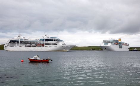 Two of this year's 79 cruise liners booked to visit Lerwick harbour this summer season. David Spence's photo of the Pacific Princess (left) and Costa Neoromantica (right) was taken on 17 July.