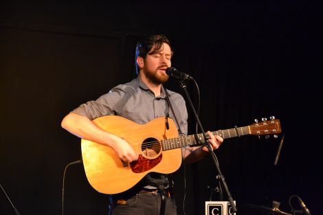 Kris Drever performing at Sandwick's Carnegie Hall in November. Photo: Shetland News.