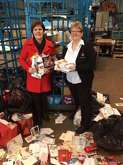 Sharon Deyell (left) and Sheila Manson of Northwards with some of the Christmas card going to be shipped south for recycling.