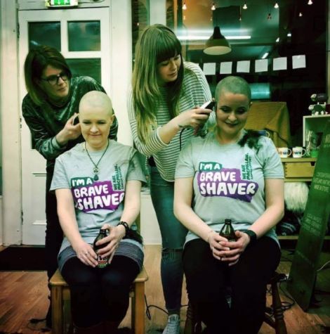 Shona Anderson and Alison Williamson go under the razors to support Macmillan. Photo: Wendy Inkster.