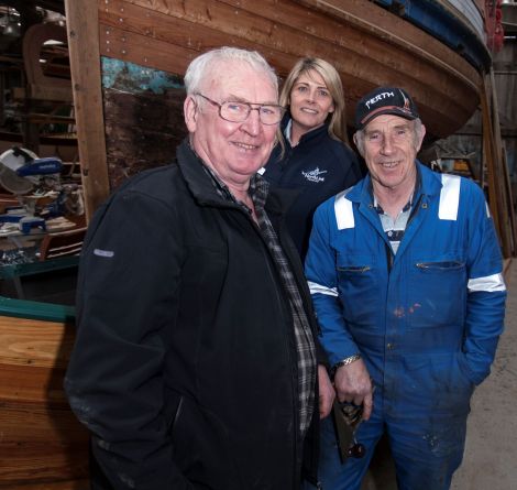 Boatbuilders Jack Duncan and Robbie Tait along with Jane Leask from Serco NorthLink.