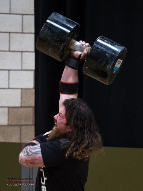 The moment when Dhanni broke the dumbbell overhead record, lifting a remarkable 90kg with one arm. Photo: John Coutts.