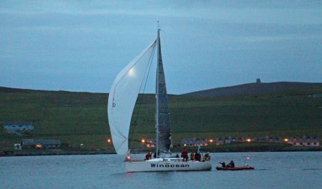 The crew of the Winocean receiving the Blue ribbon for the fastest crossing. Photo: Shetland Race Committee