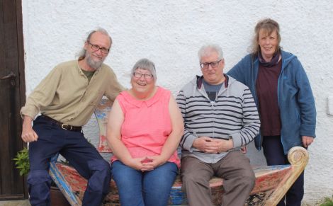 Jan and Pete Bevington with their neighbours Anne and Iain Sloan (centre) who made the 500th pledge to support Hillswick Wildlife Sanctuary.