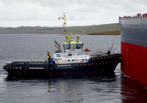 The tug in action on Tuesday as it helped berth the Antonis tanker at Sullom Voe. Photo: John Bateson