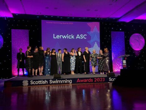 Group of individuals on stage at the scottish swimming awards 2023.