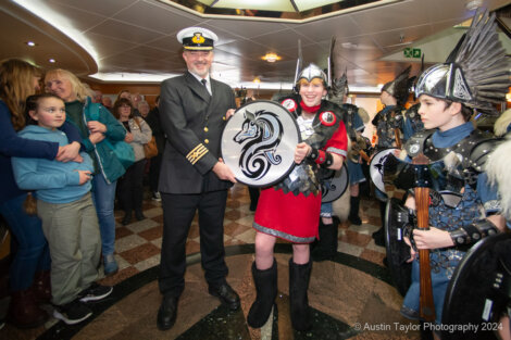 A group of people dressed as vikings on a cruise ship.