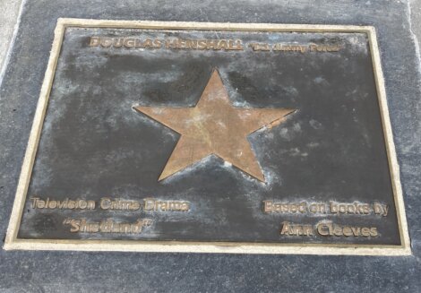 A plaque with a star on it.